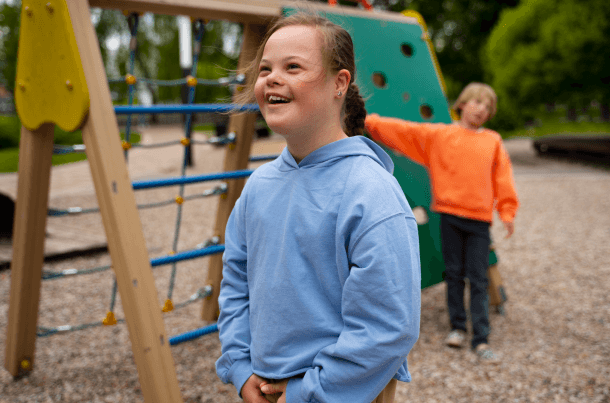 Child with a disability playing outdoors, with long-term care or ongoing support needs that may extend financial planning beyond early adulthood.