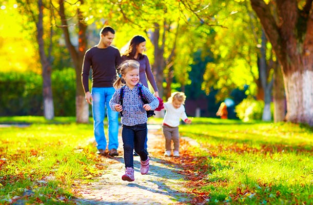 USBA Life Insurance Awareness Month - family walking in park