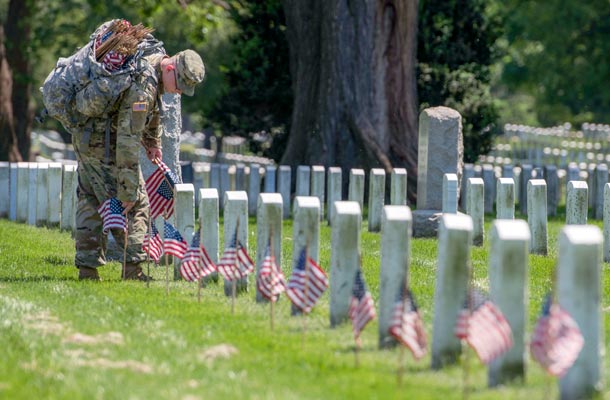 USBA Memorial Day eCard 2019 - soldier placing flags at cemetery