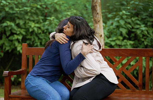 USBA Life Insurance Claims- family members hugging