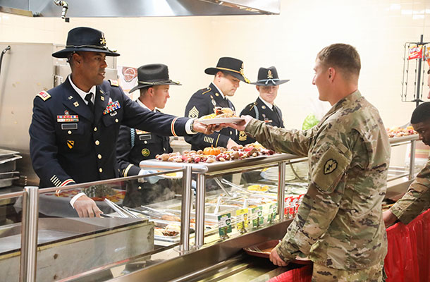 USBA soldiers serving Thanksgiving dinner